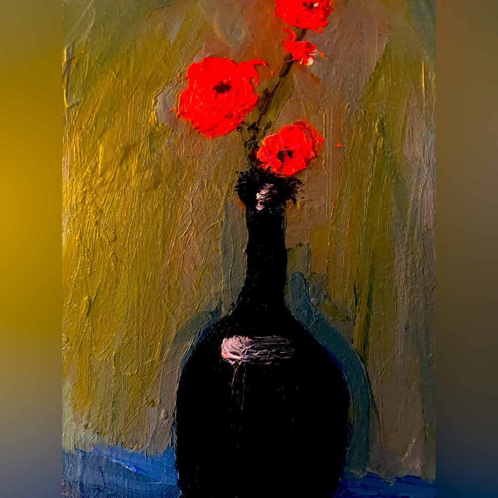 Flowers in Black Bottle.